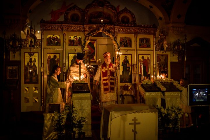 Fr Kirill and family lighting candles on behalf of all of our faithful